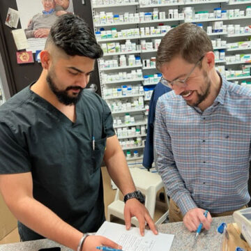 Pharmacists reviewing prescriptions